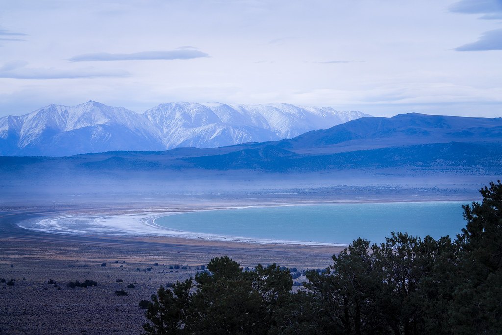 A wide mountain and valley vista of the kind hunters glass from